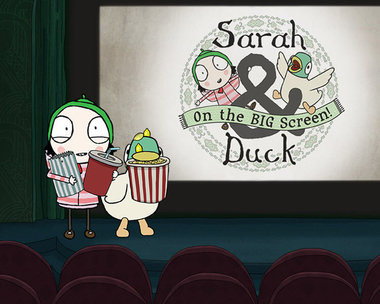 Animated characters Sarah and Duck stand in a cinema holding popcorn and drinks, with a movie screen behind them announcing Sarah & Duck on the BIG Screen!